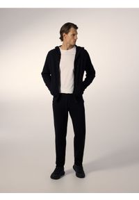 Reserved - Dzianinowe spodnie jogger - czarny. Kolor: czarny. Materiał: dzianina