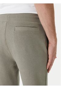 Guess Spodnie dresowe Z2YB22 KAIJ1 Zielony Regular Fit. Kolor: zielony. Materiał: bawełna #3
