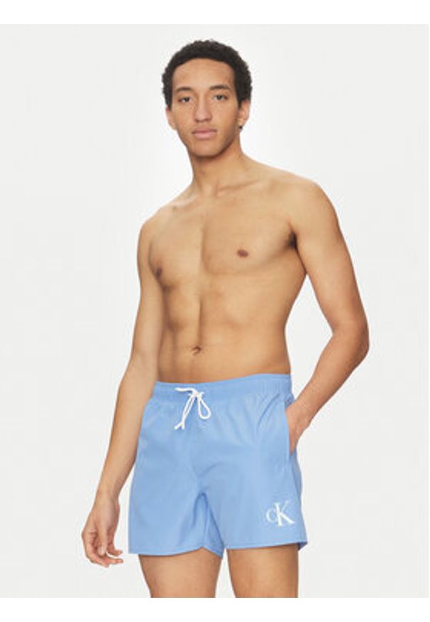 Calvin Klein Swimwear Szorty kąpielowe KM0KM01101 Niebieski Regular Fit. Kolor: niebieski. Materiał: syntetyk