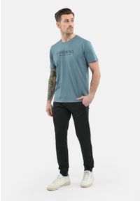 Volcano - T-shirt z napisem, Comfort Fit, T-HOLM. Kolor: niebieski. Materiał: materiał, bawełna. Długość rękawa: krótki rękaw. Długość: krótkie. Wzór: napisy. Styl: klasyczny