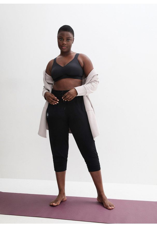 bonprix - Spodnie sportowe haremki z marszczonym dołem. Kolor: czarny. Materiał: materiał. Styl: sportowy