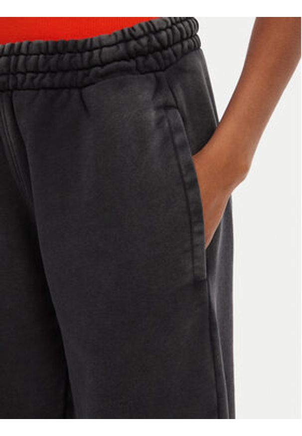 Hugo - HUGO Spodnie dresowe Nolasa_B 50545019 Czarny Loose Fit. Kolor: czarny. Materiał: bawełna