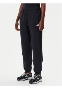 New Balance Spodnie dresowe Essentials WP41500 Czarny Relaxed Fit. Kolor: czarny. Materiał: syntetyk, bawełna
