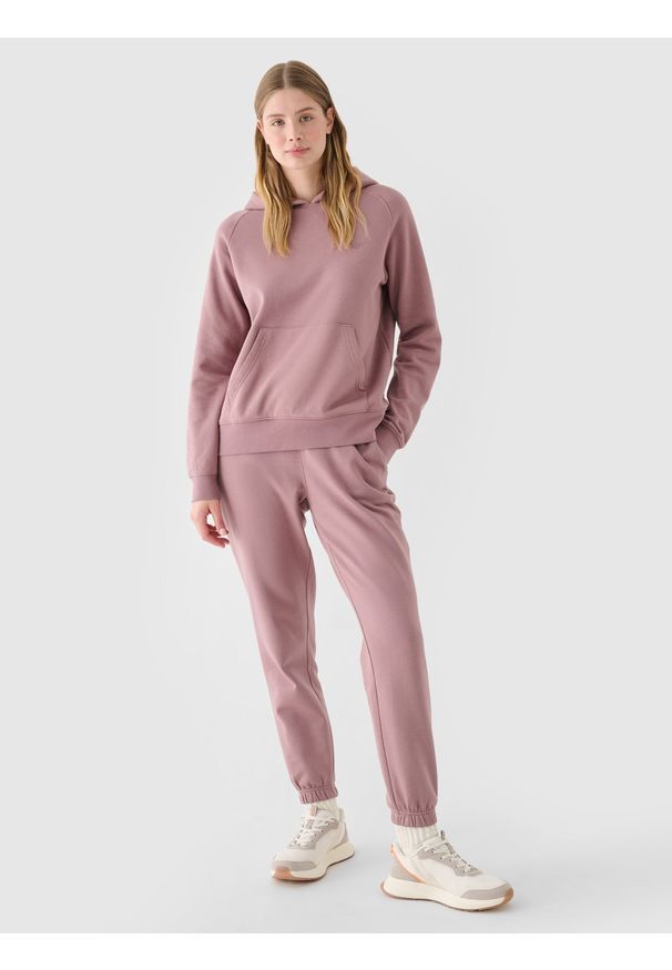 4f - 4F Spodnie dresowe joggery damskie - różowe M. Kolor: różowy. Materiał: dresówka. Wzór: ze splotem, gładki