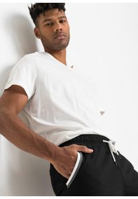 bonprix - Spodnie sportowe z kontrastowymi detalami, z czystej bawełny. Kolor: czarny. Materiał: bawełna. Styl: sportowy #2