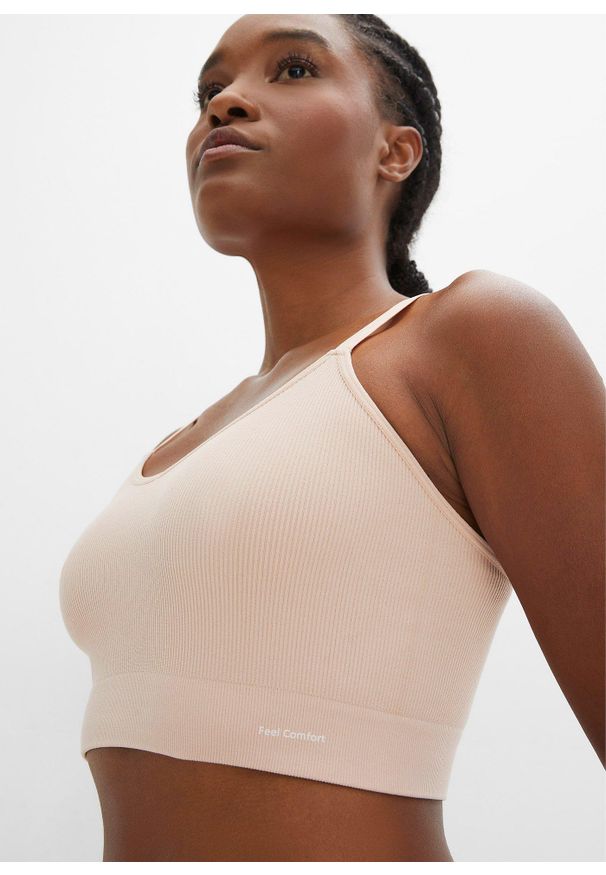 bonprix - Biustonosz bustier bezszwowy Feel Comfort w prążek. Kolor: beżowy. Materiał: materiał. Wzór: prążki