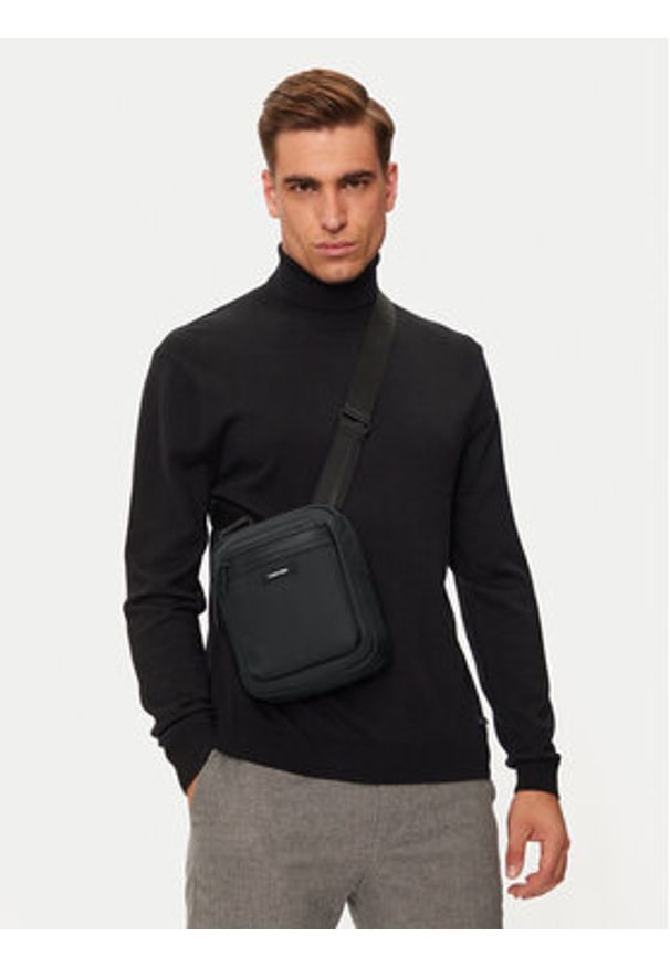 Calvin Klein Saszetka K50K512235 Czarny. Kolor: czarny. Materiał: skóra