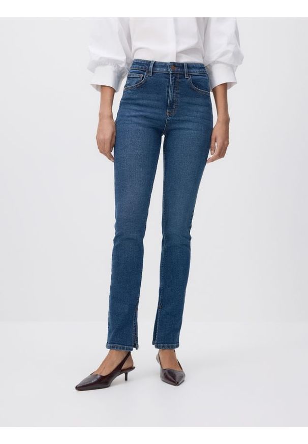 Reserved - Jeansy slim fit high waist - granatowy. Stan: podwyższony. Kolor: niebieski