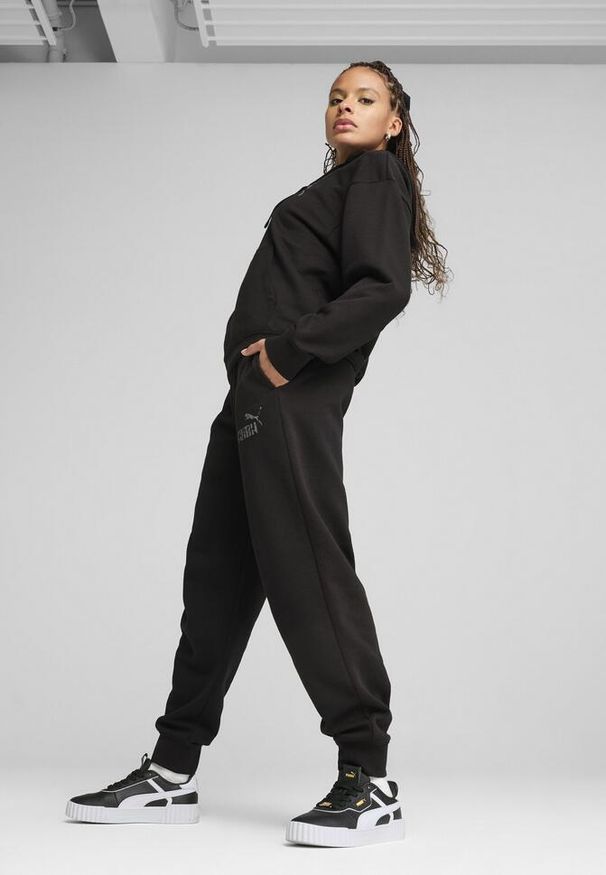 Puma - Damskie spodnie dresowe ESS NATURE 2.0 Comfort PUMA Black. Kolor: czarny. Materiał: dresówka