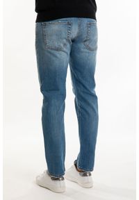 Takeshy Kurosawa Jeansy "Essential" | 83349 | Essential | Mężczyzna | Niebieski. Stan: obniżony. Kolor: niebieski. Wzór: aplikacja. Styl: klasyczny