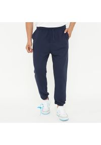 LEGEA - spodnie sportowe unisex F BALLON niebieskie. Kolor: niebieski. Materiał: guma. Sport: fitness #1