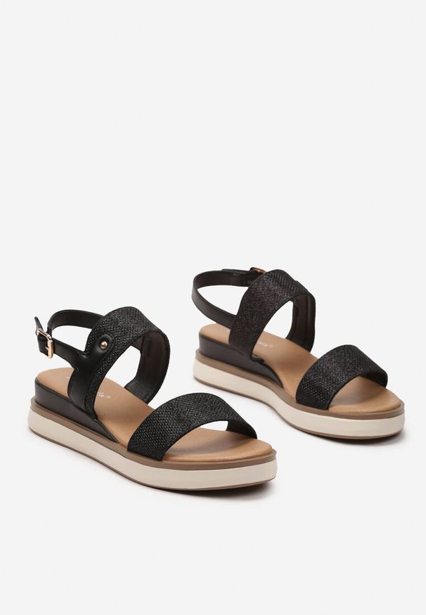 Renee - Czarne Brokatowe Płaskie Sandały Zapinane Wokół Kostki na Sprzączkę Bellisara. Okazja: na co dzień. Zapięcie: sprzączka. Kolor: czarny. Wzór: aplikacja. Obcas: na płaskiej podeszwie. Styl: casual, elegancki