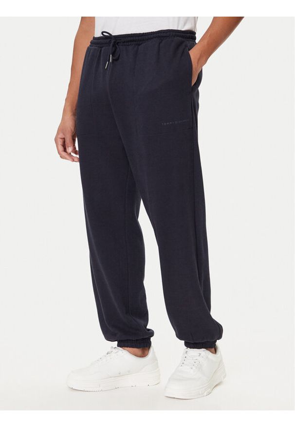 TOMMY HILFIGER - Tommy Hilfiger Spodnie dresowe UM0UM03627 Niebieski Regular Fit. Kolor: niebieski. Materiał: bawełna