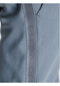 Calvin Klein Spodnie dresowe Logo Tape K10K110820 Szary Regular Fit. Kolor: szary. Materiał: dresówka, syntetyk #5