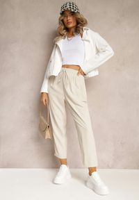 Renee - Beżowe Spodnie High Waist z Gumką i Troczkiem w Pasie oraz Kieszeniami Arlettia. Stan: podwyższony. Kolor: beżowy. Materiał: tkanina. Długość: długie. Wzór: jednolity #5