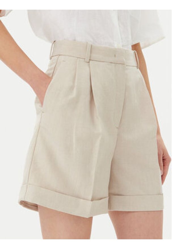 TOMMY HILFIGER - Tommy Hilfiger Szorty materiałowe WW0WW44767 Beżowy Regular Fit. Kolor: beżowy. Materiał: syntetyk
