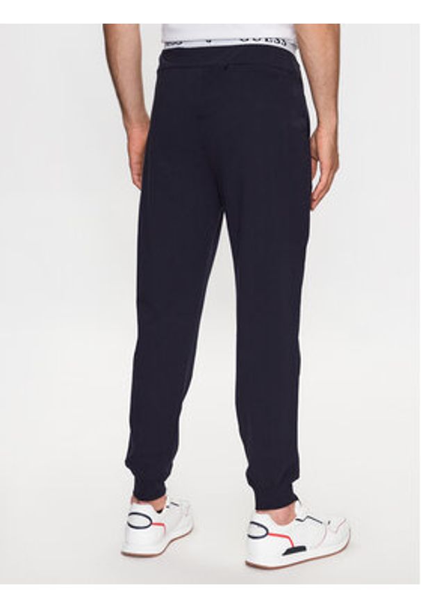 Guess Spodnie piżamowe U3YB00 KBS91 Granatowy Regular Fit. Kolor: niebieski. Materiał: bawełna