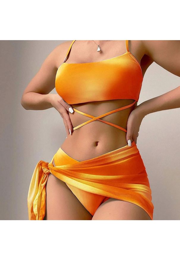 Intica - Komplet bikini z pareo na plażę i basen Eufrasia. Kolor: pomarańczowy. Materiał: materiał