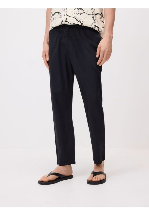 Reserved - Bawełniane spodnie jogger - czarny. Kolor: czarny. Materiał: bawełna