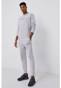 Calvin Klein Performance - Spodnie. Okazja: na co dzień. Kolor: szary. Wzór: nadruk. Styl: casual #2