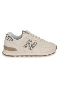 Buty do chodzenia damskie New Balance 574. Zapięcie: sznurówki. Kolor: beżowy. Materiał: materiał. Szerokość cholewki: normalna. Model: New Balance 574. Sport: turystyka piesza