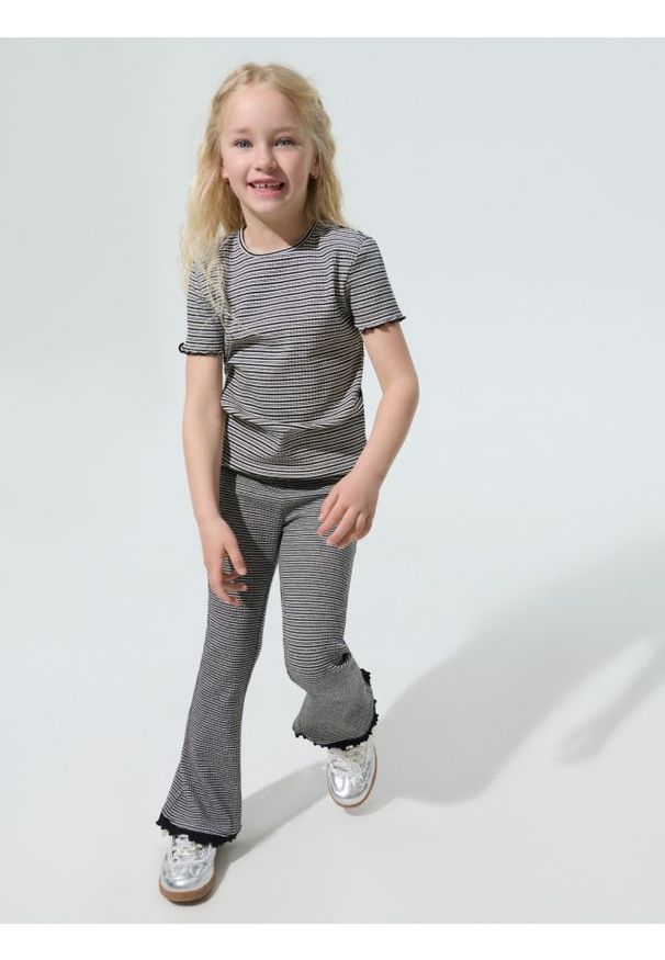 Sinsay - Bawełniane legginsy flare - czarny. Kolor: czarny. Materiał: bawełna