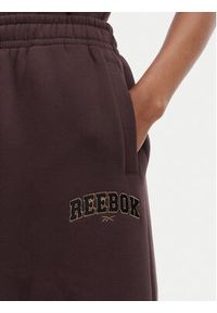 Reebok Spodnie dresowe Iza RK25687CCW Brązowy ciemny Regular Fit. Kolor: brązowy. Materiał: bawełna #8
