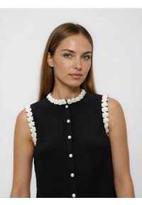 Reserved - Kamizelka z ozdobnym wykończeniem - czarny. Kolor: czarny. Materiał: dzianina, wiskoza #1