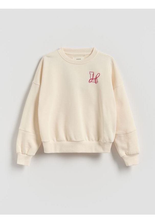 Reserved - Bluza z drobnym nadrukiem - złamana biel. Materiał: bawełna. Wzór: nadruk