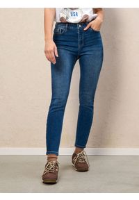 Sinsay - Spodnie jeansowe skinny - granatowy. Kolor: niebieski