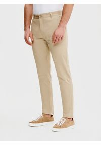 Pako Lorente - PAKO LORENTE – Beżowe gładkie spodnie męskie. Kolor: beżowy. Materiał: bawełna, elastan. Wzór: gładki. Styl: klasyczny #1