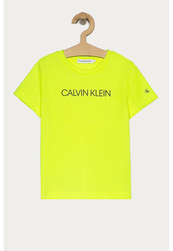 Calvin Klein Jeans - T-shirt dziecięcy 104-176 cm. Okazja: na co dzień. Kolor: żółty. Materiał: bawełna, poliester, dzianina. Wzór: nadruk. Styl: casual