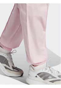 Adidas - adidas Spodnie dresowe Loose Trousers with Healing Crystals-Inspired Graphics IC0795 Różowy Loose Fit. Kolor: różowy. Materiał: bawełna #7