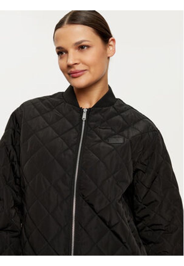 Calvin Klein Jeans Kurtka bomber J20J224701 Czarny Relaxed Fit. Kolor: czarny. Materiał: syntetyk