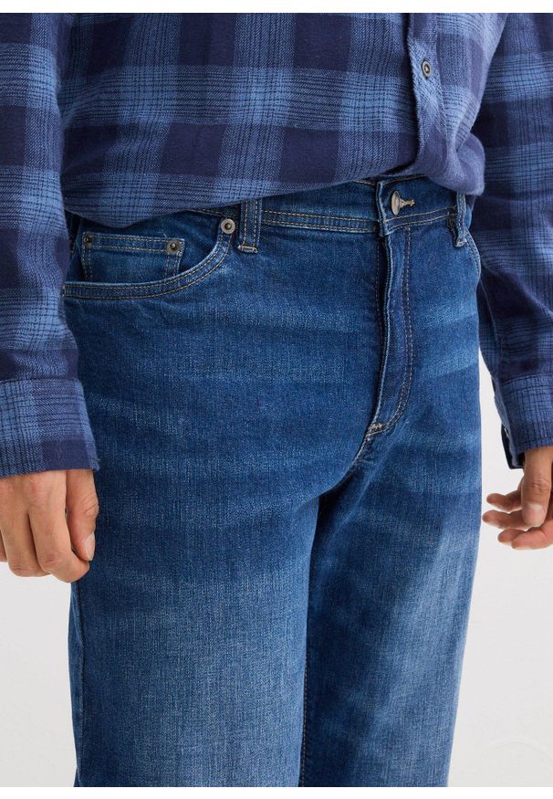 bonprix - Jeansy ze stretchem, regular fit, straight. Kolor: niebieski