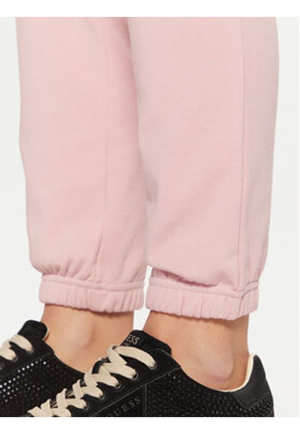 Guess Spodnie dresowe O5RB01 KCO31 Różowy Regular Fit. Kolor: różowy. Materiał: bawełna