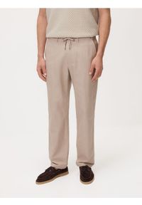 Reserved - Spodnie chino regular fit - beżowy. Kolor: beżowy. Materiał: tkanina, len