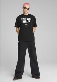Puma - Męska koszulka Concept 2 Berlin o luźnym kroju PUMA Black. Kolor: czarny