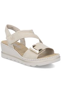 Sandały damskie na koturnie bezowe Rieker 67410-62. Materiał: skóra ekologiczna. Obcas: na koturnie #1