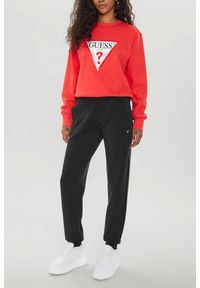 Guess - GUESS Czarne damskie spodnie dresowe Olympe. Kolor: czarny. Materiał: dresówka