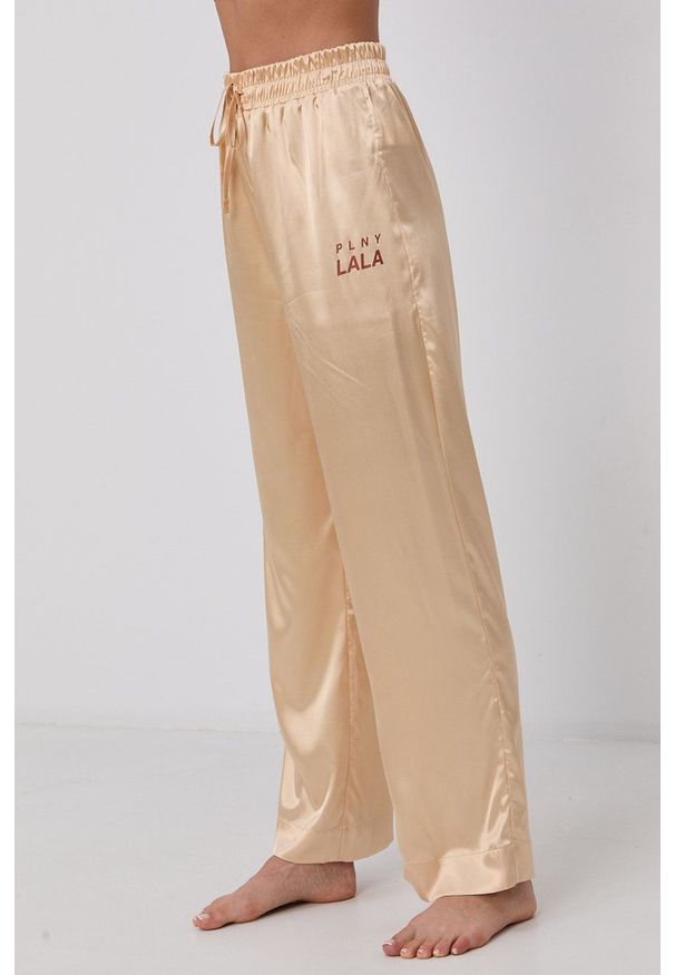 PLNY LALA - Spodnie piżamowe. Kolor: złoty. Materiał: satyna, materiał. Wzór: ze splotem