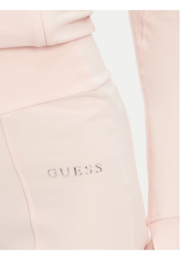 Guess Spodnie dresowe V5RB15 KCD02 Różowy Regular Fit. Kolor: różowy. Materiał: syntetyk