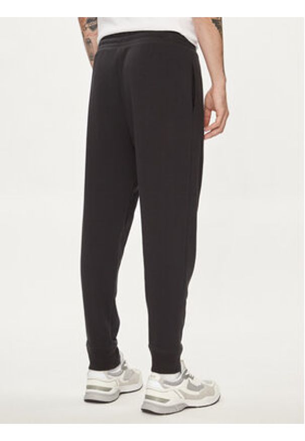GAP - Gap Spodnie dresowe 868463-03 Czarny Regular Fit. Kolor: czarny. Materiał: bawełna