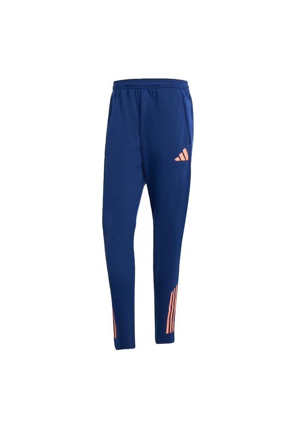 Adidas - Spodnie Tiro 25 Competition Winterized. Kolor: pomarańczowy, niebieski, wielokolorowy. Materiał: dresówka. Sport: fitness, piłka nożna