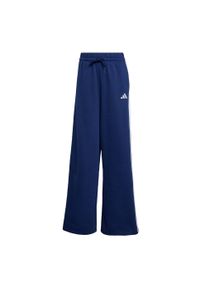 Adidas - Spodnie adidas 3-Stripes Fleece Wide. Kolor: niebieski