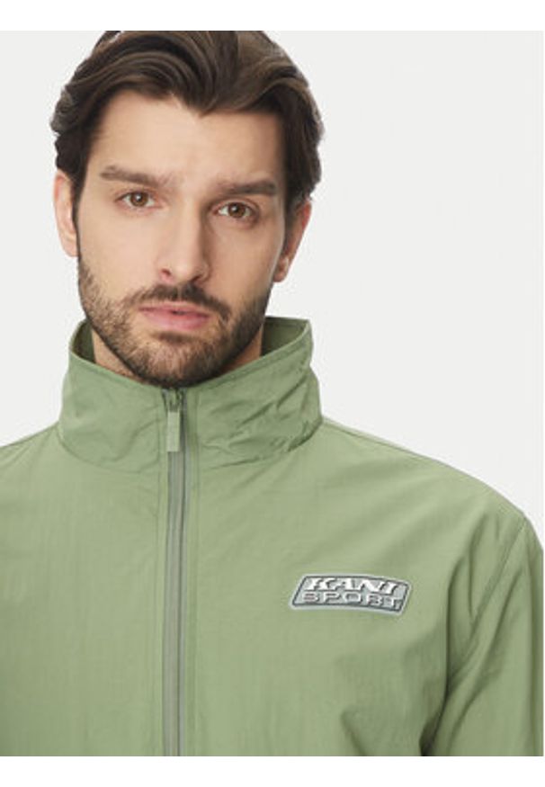Karl Kani Kurtka przejściowa 60860088 Zielony Regular Fit. Kolor: zielony. Materiał: syntetyk