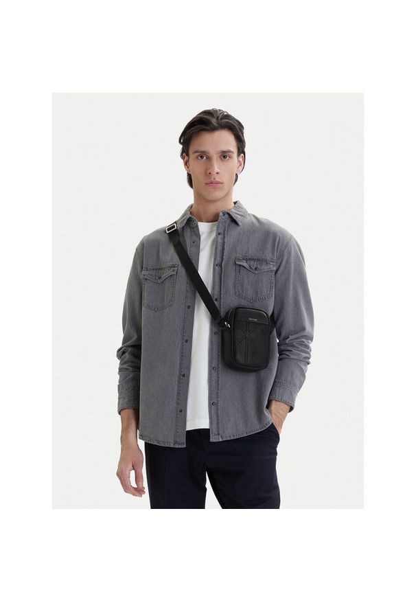 Saszetka Calvin Klein. Kolor: czarny