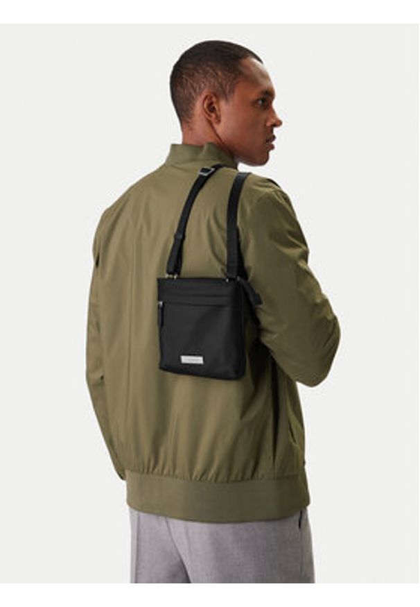 Calvin Klein Saszetka Sleek Slim Flatpack LV04D3234G Czarny. Kolor: czarny. Materiał: materiał