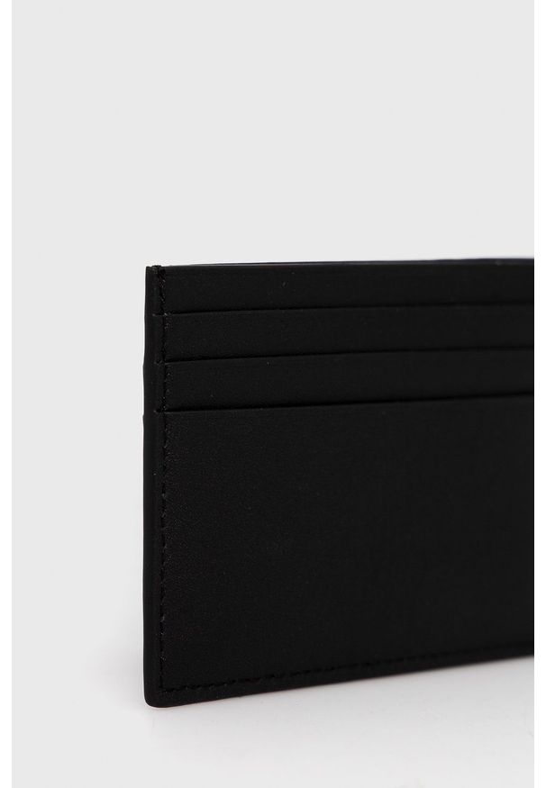Calvin Klein Portfel skórzany męski kolor czarny. Kolor: czarny. Materiał: włókno, materiał. Wzór: gładki