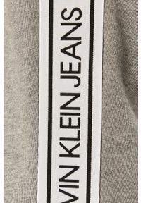 Calvin Klein Jeans - Spodnie. Kolor: szary. Materiał: bawełna, poliester, dzianina. Wzór: aplikacja #2
